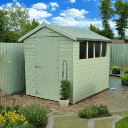 green wooden shed